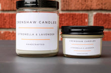 Load image into Gallery viewer, Two soy candles with their respective labels showing. One larger jar labeled 'Citronella & Lavender' and a smaller jar with 'Titronella Lavender' written on it, both with 'Crenshaw Candles' branding.